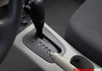 Подержанный автомобиль Kia Cerato Hatchback 2007 года (14 фото)