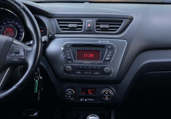 Подержанный автомобиль Kia Rio Sedan 2013 года (11 фото)