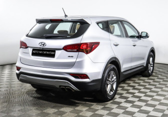 Подержанный автомобиль Hyundai Santa Fe 2016 года (3 фото)