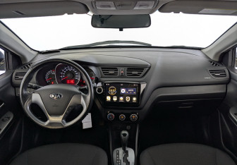 Подержанный автомобиль Kia Rio Sedan 2015 года (14 фото)