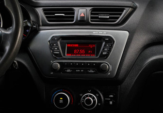 Подержанный автомобиль Kia Rio Hatchback 2013 года (10 фото)