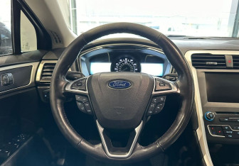 Подержанный автомобиль Ford Fusion (North America) 2015 года (18 фото)