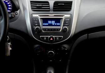 Подержанный автомобиль Hyundai Solaris Sedan 2013 года (15 фото)