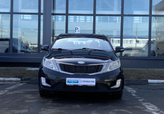 Подержанный автомобиль Kia Rio Sedan 2013 года (2 фото)