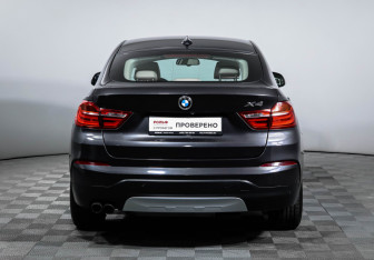 Подержанный автомобиль BMW X4 2014 года (6 фото)