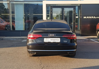 Подержанный автомобиль Audi A8 2014 года (6 фото)