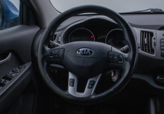 Подержанный автомобиль Kia Sportage 2014 года (15 фото)