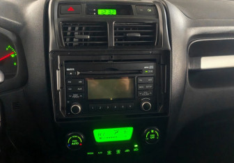 Подержанный автомобиль Kia Sportage 2010 года (13 фото)