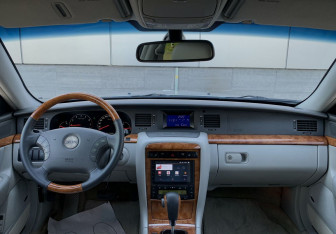 Подержанный автомобиль Kia Opirus 2003 года (14 фото)