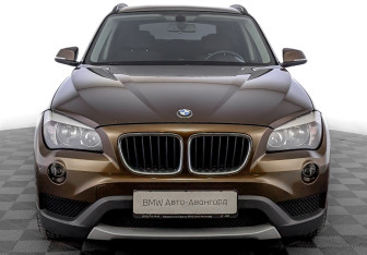 Подержанный автомобиль BMW X1 2012 года (2 фото)