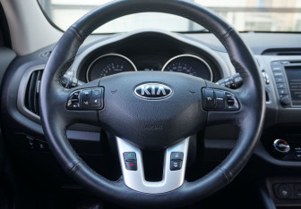 Подержанный автомобиль Kia Sportage 2014 года (14 фото)