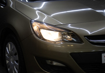 Подержанный автомобиль Opel Astra Hatchback 2013 года (21 фото)