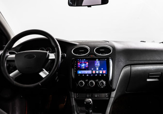 Подержанный автомобиль Ford Focus Hatchback 2006 года (11 фото)