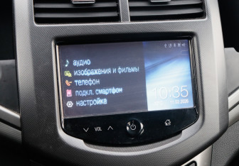 Подержанный автомобиль Chevrolet Aveo Sedan 2014 года (16 фото)