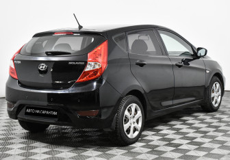Подержанный автомобиль Hyundai Solaris Hatchback 2012 года (5 фото)