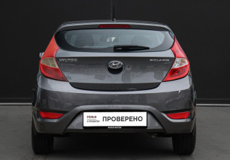 Подержанный автомобиль Hyundai Solaris Hatchback 2011 года (6 фото)