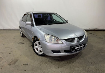 Подержанный автомобиль Mitsubishi Lancer Sedan 2003 года (3 фото)
