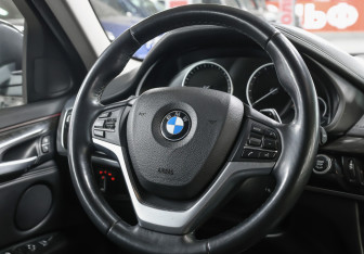 Подержанный автомобиль BMW X6 2015 года (17 фото)
