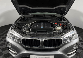 Подержанный автомобиль BMW X6 2018 года (10 фото)