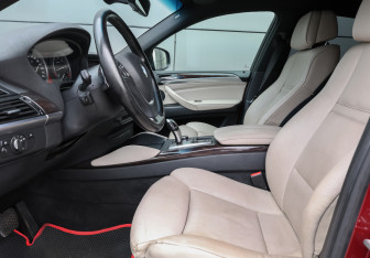 Подержанный автомобиль BMW X6 2012 года (15 фото)
