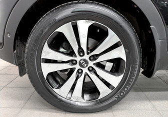 Подержанный автомобиль Kia Sportage 2011 года (18 фото)