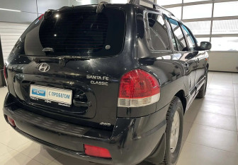 Подержанный автомобиль Hyundai Santa Fe 2011 года (8 фото)