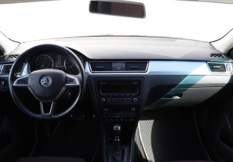 Подержанный автомобиль Skoda Rapid Liftback 2014 года (13 фото)