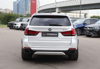 Подержанный автомобиль BMW X5 2014 года (6 фото)