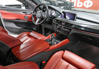 Подержанный автомобиль BMW X6 2017 года (12 фото)