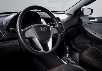 Подержанный автомобиль Hyundai Solaris Sedan 2013 года (14 фото)