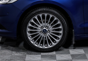 Подержанный автомобиль Ford Mondeo Sedan 2015 года (15 фото)