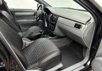 Подержанный автомобиль Chevrolet Lacetti Sedan 2012 года (13 фото)