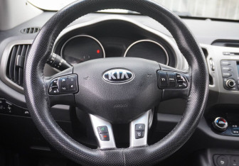 Подержанный автомобиль Kia Sportage 2014 года (14 фото)