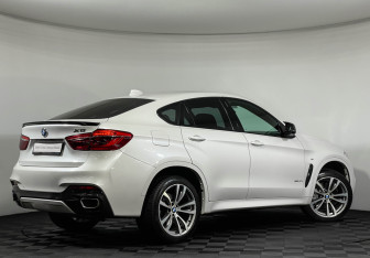 Подержанный автомобиль BMW X6 2019 года (2 фото)