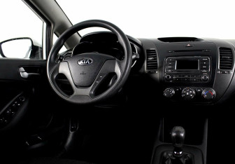 Подержанный автомобиль Kia Cerato Sedan 2013 года (6 фото)