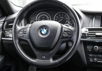 Подержанный автомобиль BMW X4 2016 года (18 фото)
