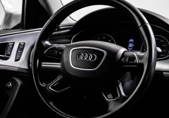 Подержанный автомобиль Audi A6 Sedan 2015 года (15 фото)