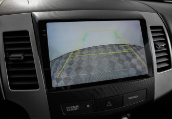 Подержанный автомобиль Peugeot 4007 2010 года (13 фото)