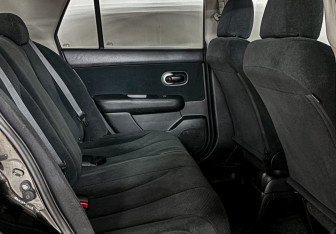 Подержанный автомобиль Nissan Tiida Sedan 2013 года (12 фото)