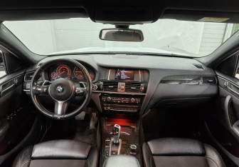 Подержанный автомобиль BMW X4 2016 года (11 фото)