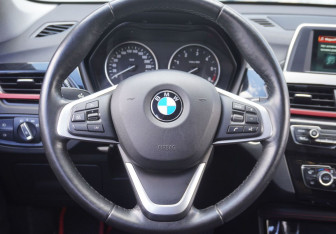 Подержанный автомобиль BMW X1 2018 года (14 фото)