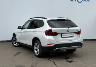 Подержанный автомобиль BMW X1 2014 года (7 фото)