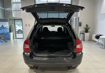 Подержанный автомобиль Kia Sportage 2009 года (7 фото)
