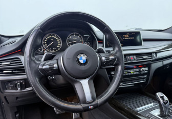 Подержанный автомобиль BMW X5 2014 года (18 фото)