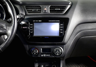 Подержанный автомобиль Kia Rio Hatchback 2013 года (10 фото)