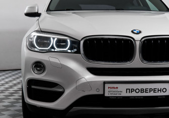 Подержанный автомобиль BMW X6 2016 года (17 фото)