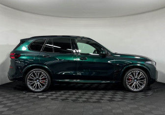 Подержанный автомобиль BMW X5 2024 года (6 фото)