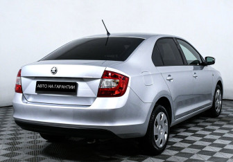Подержанный автомобиль Skoda Rapid Liftback 2015 года (3 фото)