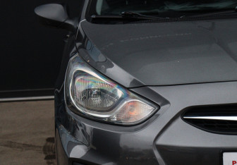 Подержанный автомобиль Hyundai Solaris Hatchback 2011 года (17 фото)