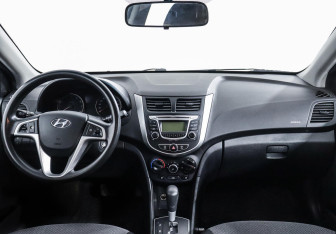 Подержанный автомобиль Hyundai Solaris Hatchback 2013 года (6 фото)